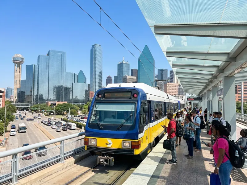 DART light rail train at Victory Station in Dallas — departure point for the World Cup Bus Bridge to Arlington